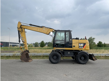 Pyöräalustainen kaivinkone CATERPILLAR M313D