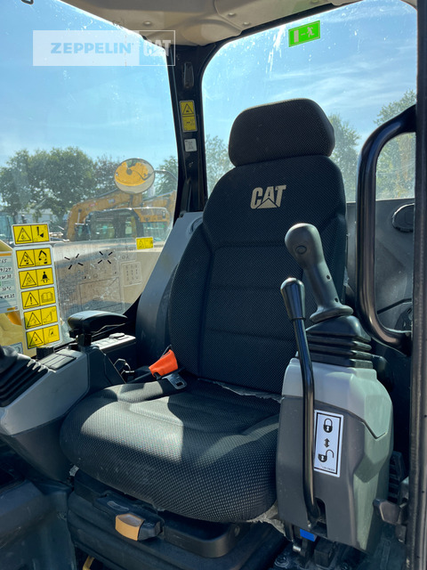 Minikuormaaja Cat 310: kuva Minikuormaaja Cat 310